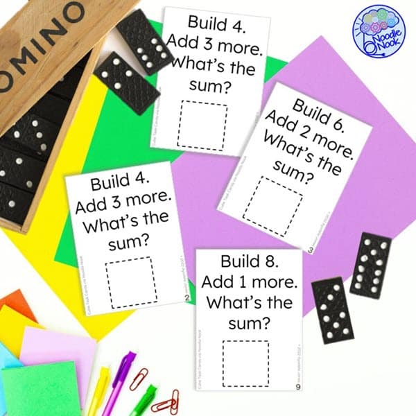 Image featuring dominos and task cards for composing and decomposing numbers.